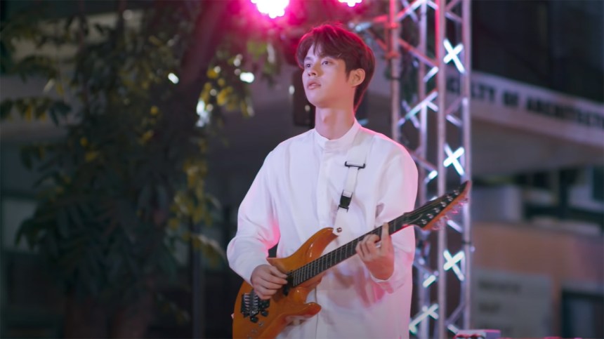 Bright as Tine playing during a concert in 2gether the Series